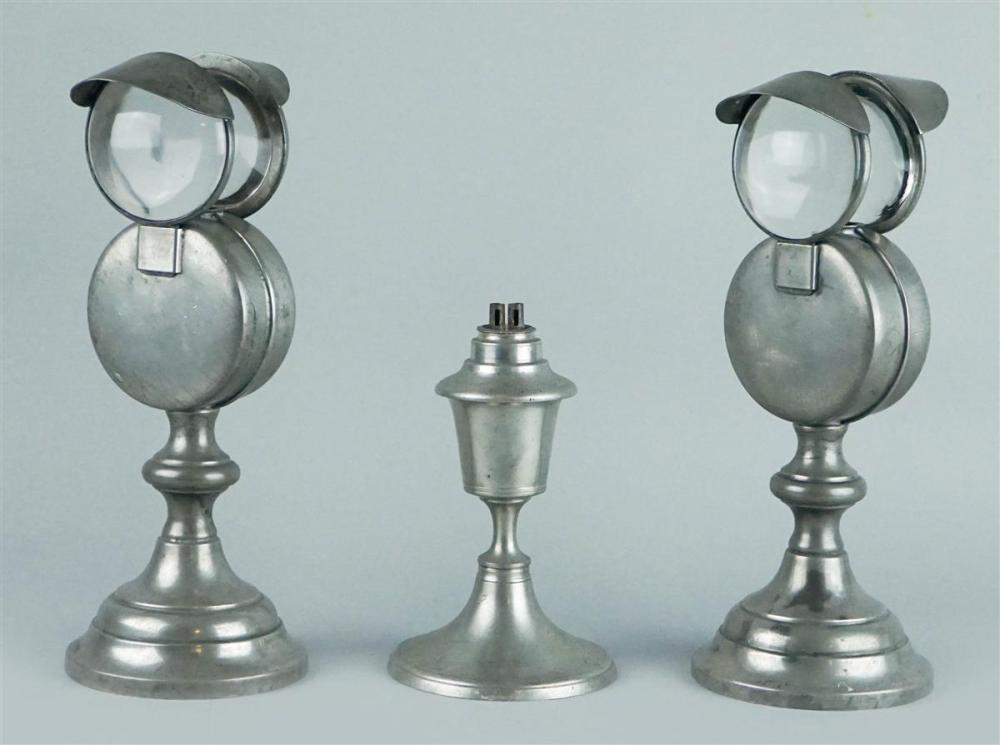 THREE SILVER TIN OIL LAMPSTHREE