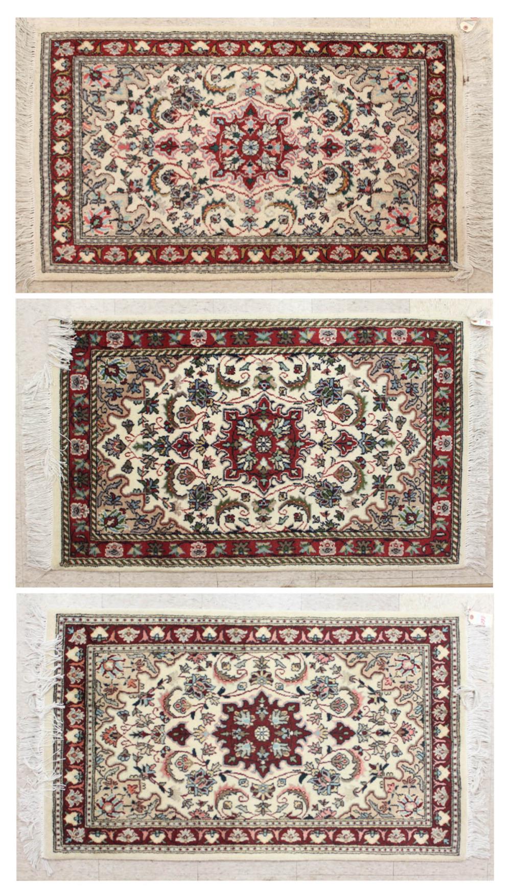 THREE SIMILAR HAND KNOTTED ORIENTAL