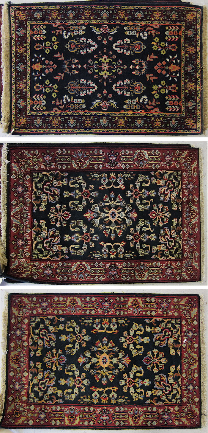 THREE SIMILAR ORIENTAL AREA RUGS