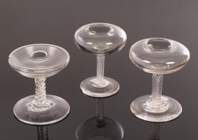 Three small lacemaker's lamps;