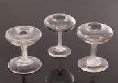 Three small lacemaker's lamps;