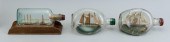 THREE SMALL SHIPS IN BOTTLES E