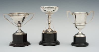 Three Small Trophies on Plastic