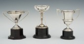 Three Small Trophies on Plasti