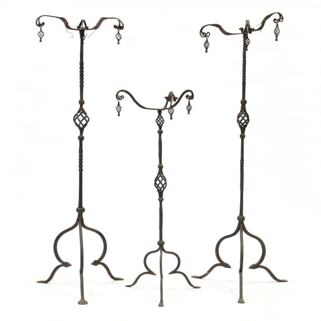 THREE SPANISH WROUGHT IRON STANDS