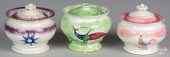 THREE SPATTERWARE SUGAR BOWLS,