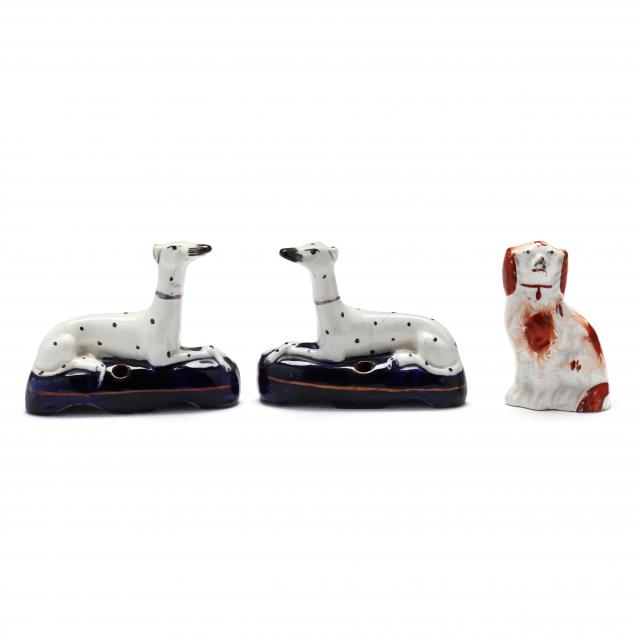 THREE STAFFORDSHIRE DOG FIGURES
