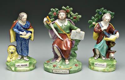 Three Staffordshire figures,