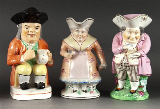 Three Staffordshire toby jugs