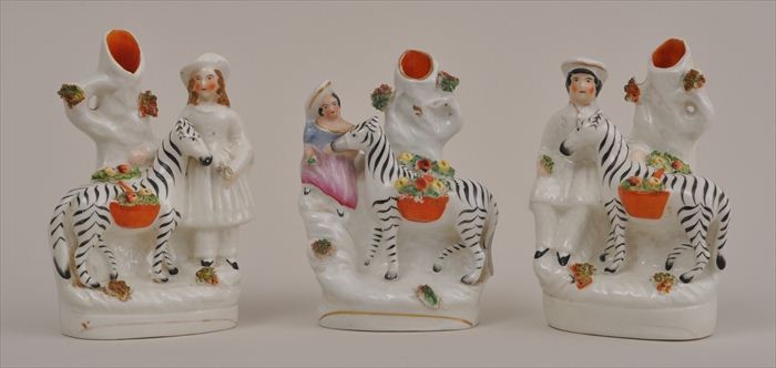 THREE STAFFORDSHIRE ZEBRA SPILL