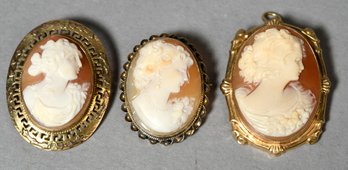 Three stamped 10k gold cameo pins
