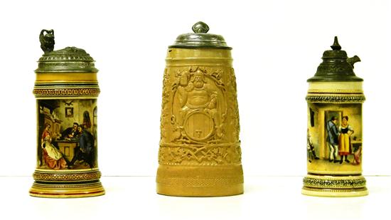 Three steins including: stoneware