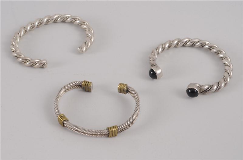 THREE STERLING CUFFS