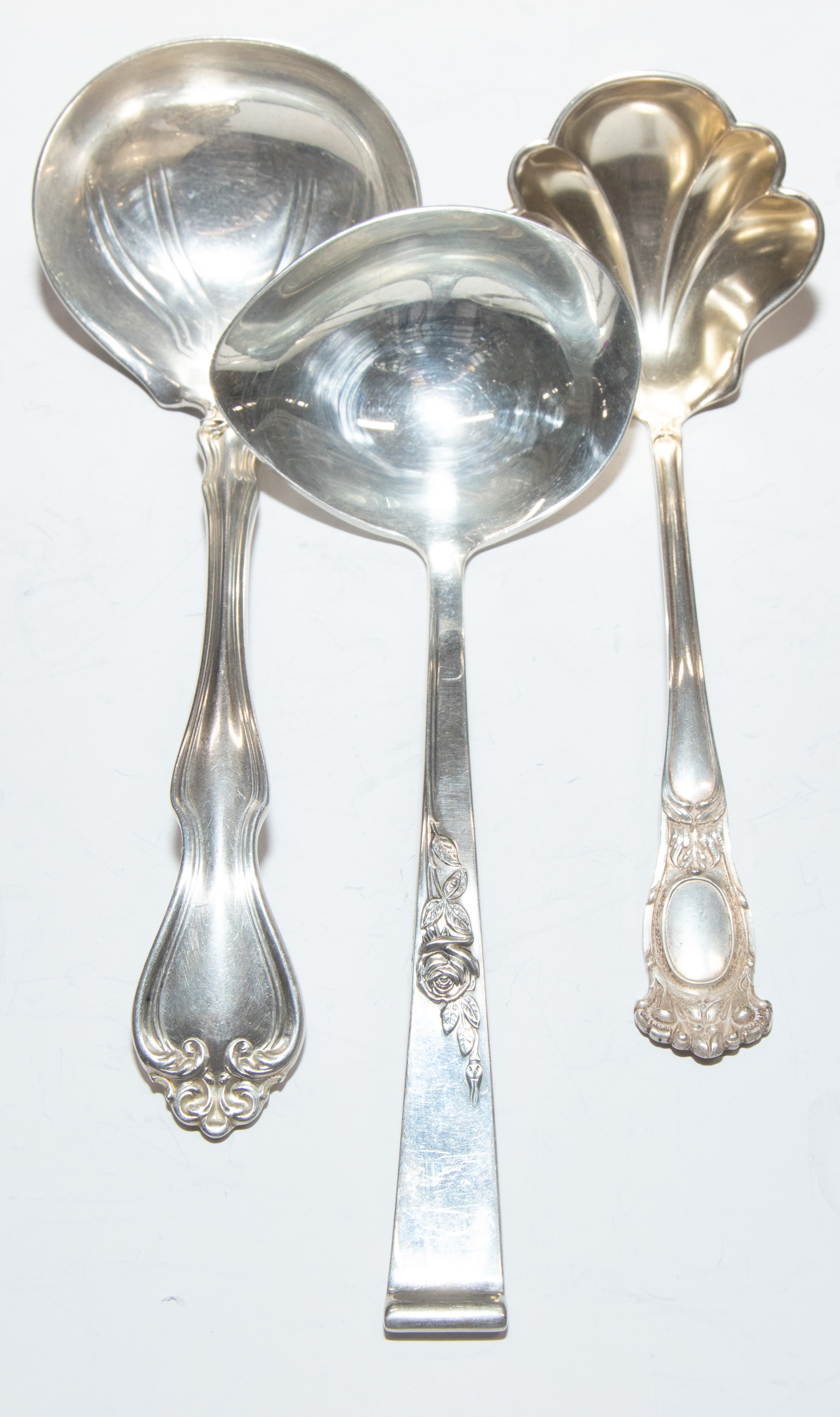 THREE STERLING SAUCE LADLES