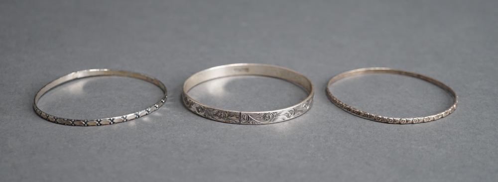 THREE STERLING SILVER BANGLE