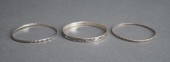 THREE STERLING SILVER BANGLE B