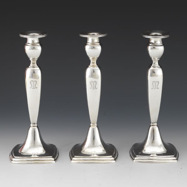 THREE STERLING SILVER CANDLESTICKS