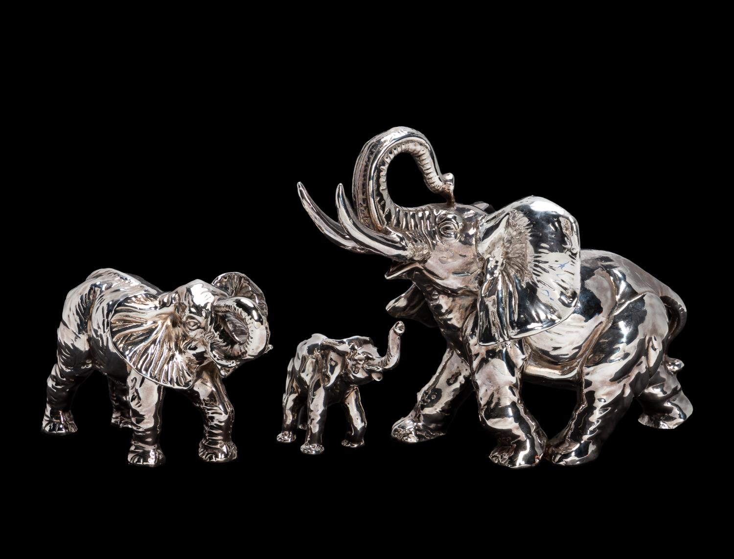 THREE STERLING SILVER CLAD ELEPHANT