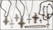 THREE STERLING SILVER CROSSES.
