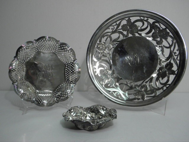 Three sterling silver dishes.