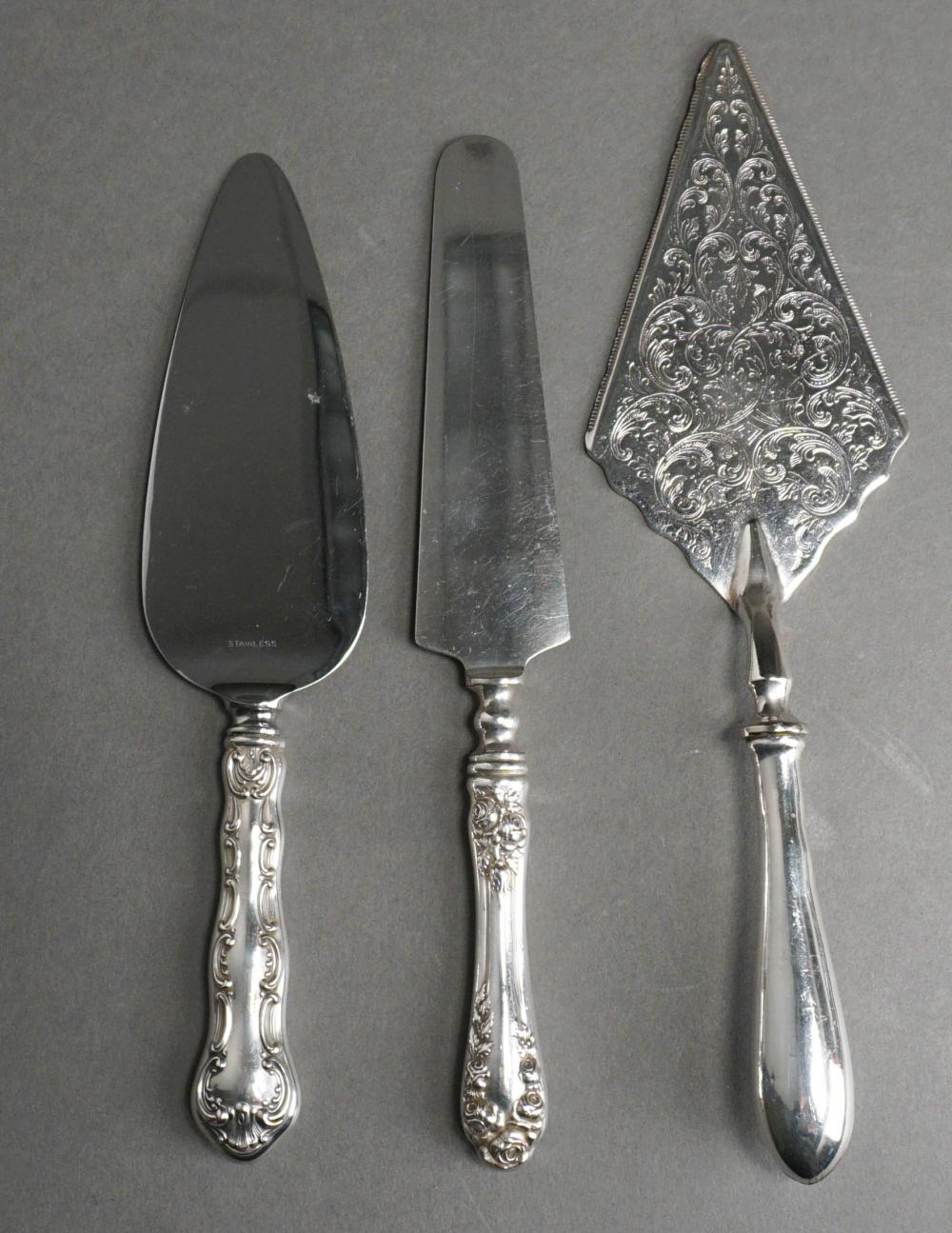 THREE STERLING SILVER HANDLE CAKE