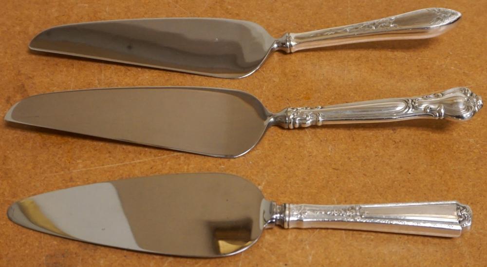 THREE STERLING SILVER HANDLE CAKE