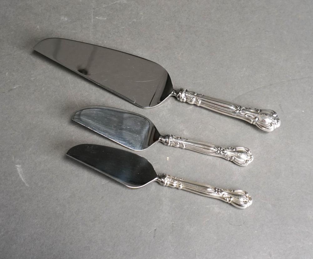 THREE STERLING SILVER HANDLED