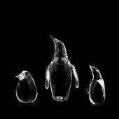 THREE STEUBEN CRYSTAL PENGUIN