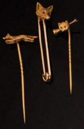 Three stick pins of hunting in