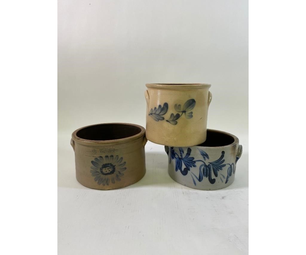 Three stoneware crocks, one