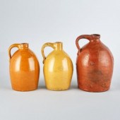 THREE STONEWARE JUGSA group of