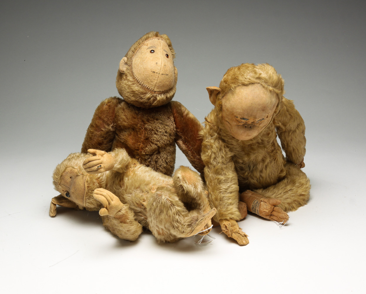 THREE STUFFED MONKEY TOYS. First