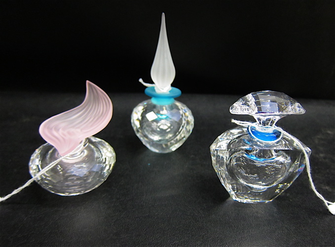 THREE SWAROVSKI CRYSTAL PERFUMES: