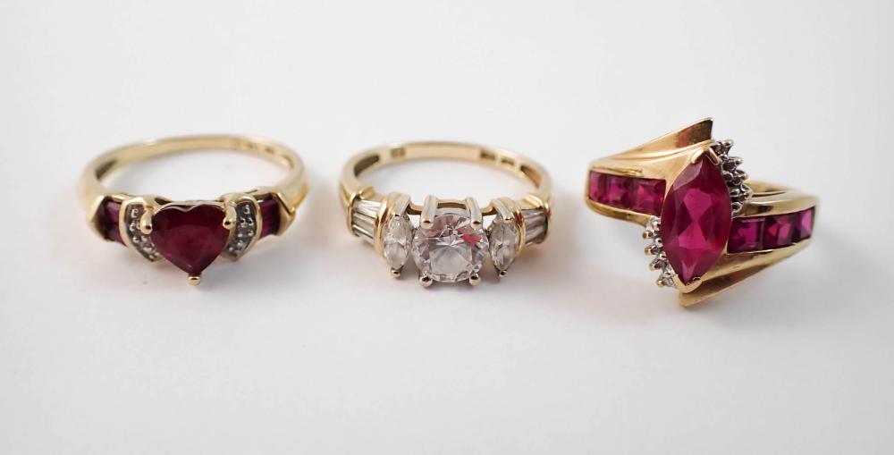THREE TEN KARAT YELLOW AND WHITE