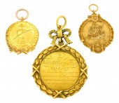 THREE TESTED 14K GOLD MEDALS: