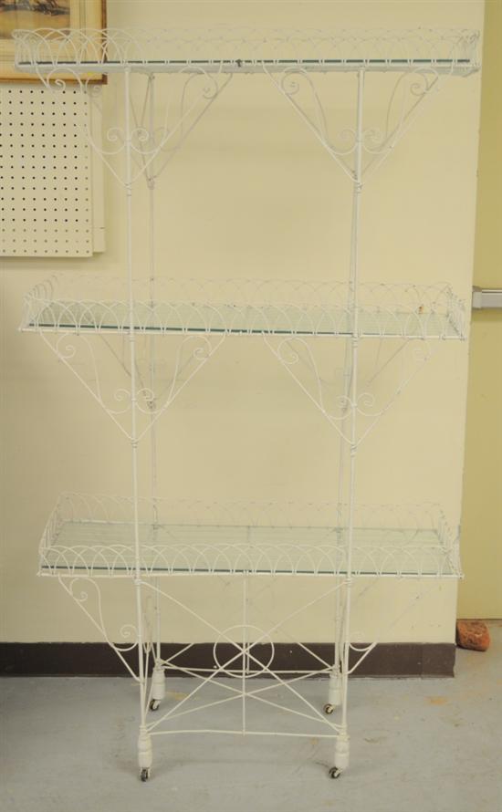 Three tier painted white wire plant
