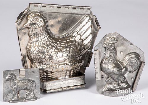 THREE TIN CHOCOLATE MOLDS, CA.