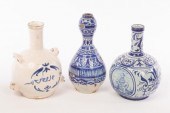 Three tin-glazed bottles, 17th