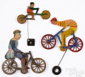 THREE TIN LITHOGRAPH BICYCLE B