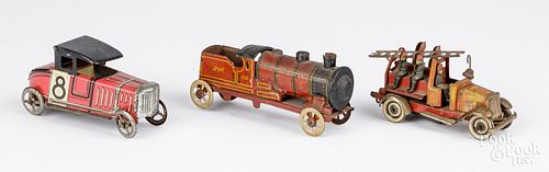 THREE TIN NICKEL TOYSThree tin
