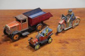 THREE TIN WIND-UP TOYS.  Germa
