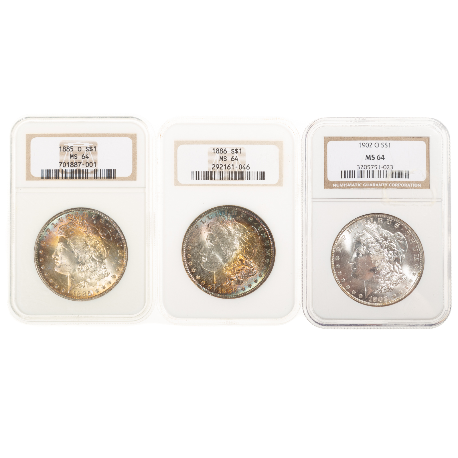 THREE TONED NGC 64 SILVER DOLLARS