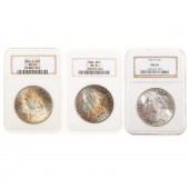 THREE TONED NGC 64 SILVER DOLL