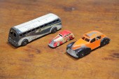 THREE TOY AUTOMOBILES.  Americ