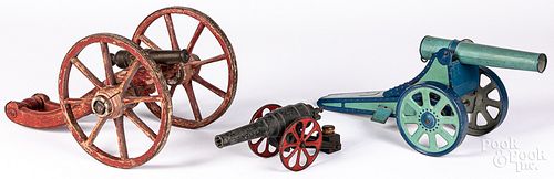 THREE TOY CANNONSThree toy cannons,