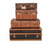 Three travel suitcases with wo