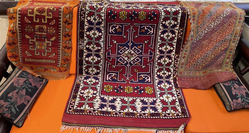 THREE TRIBAL RUGS, LARGEST: 4 FT