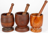 THREE TURNED MORTARS AND PESTL