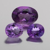 THREE UNMOUNTED 23.91 CT TOTAL