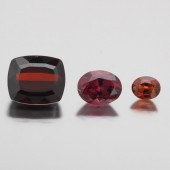 THREE UNMOUNTED 24.91 CT TOTAL